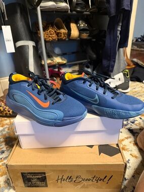 Nike Blue Low-Top Sneakers with Orange & Teal Swooshes